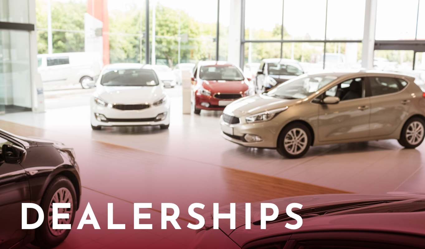An interior view of a car dealership.